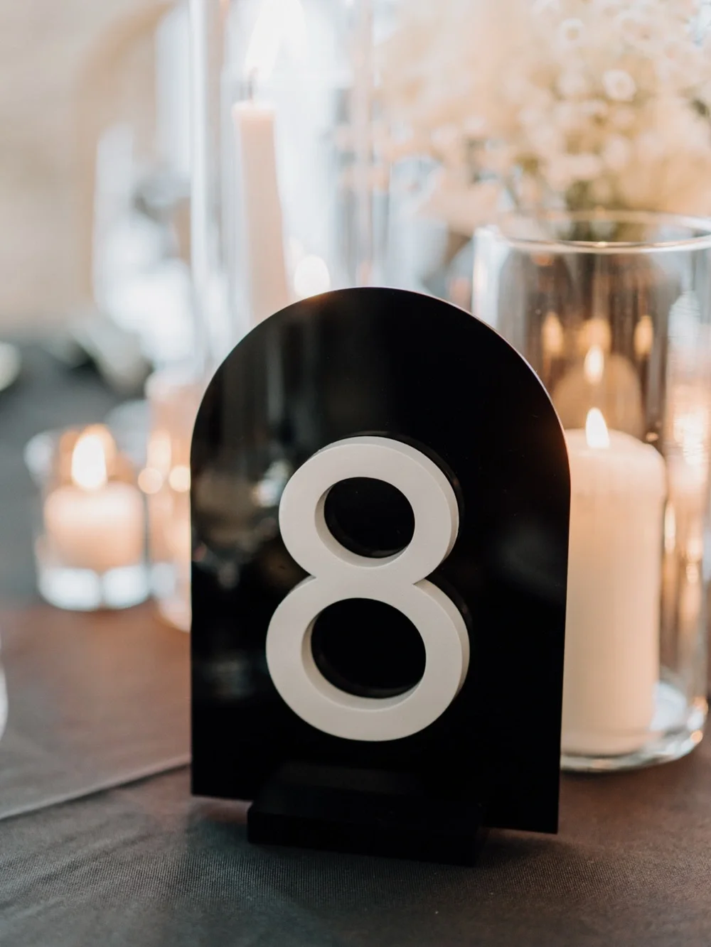Set of Black Arched Number Plaques with White Numbers (1-10)